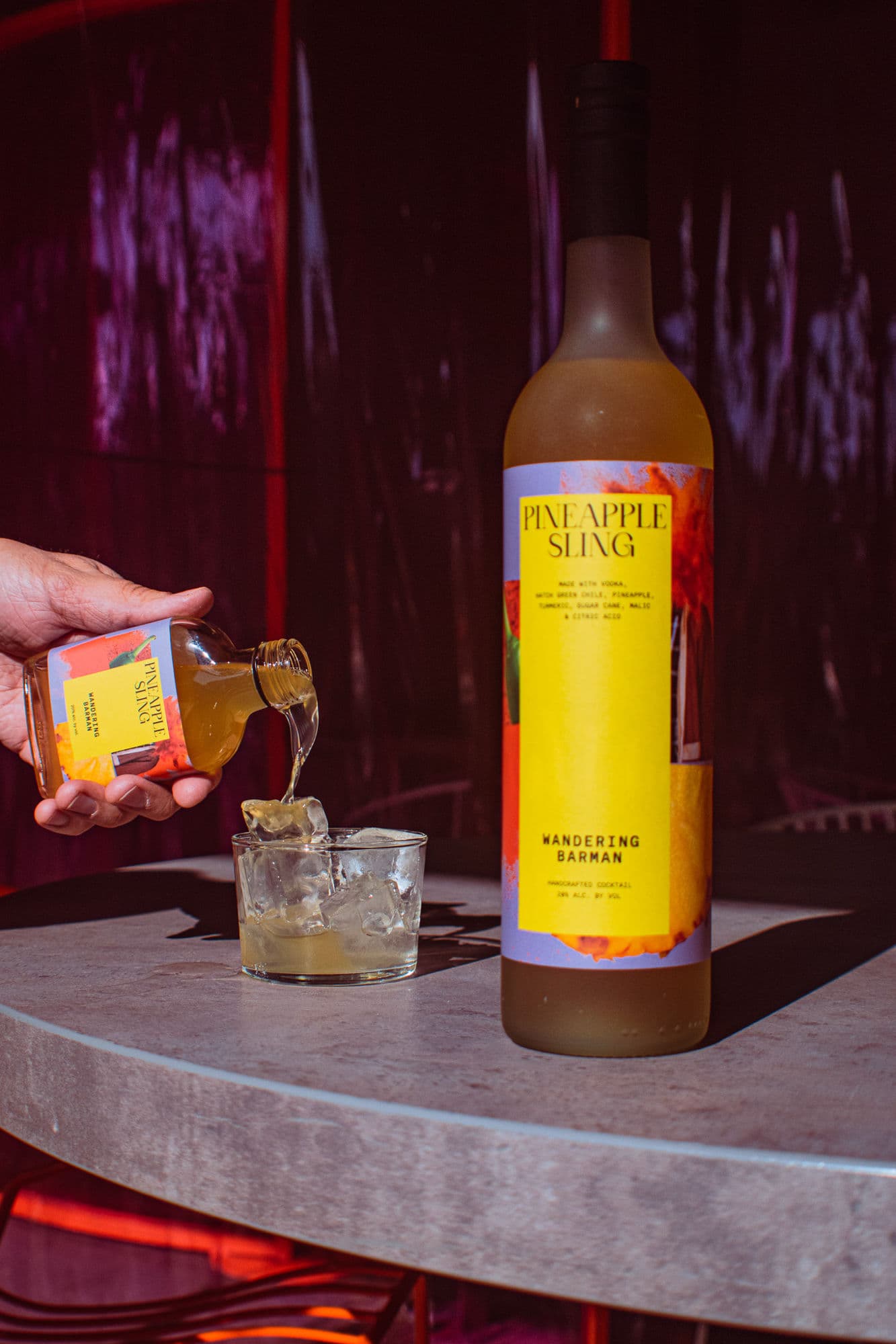 Pineapple Sling cocktail being poured